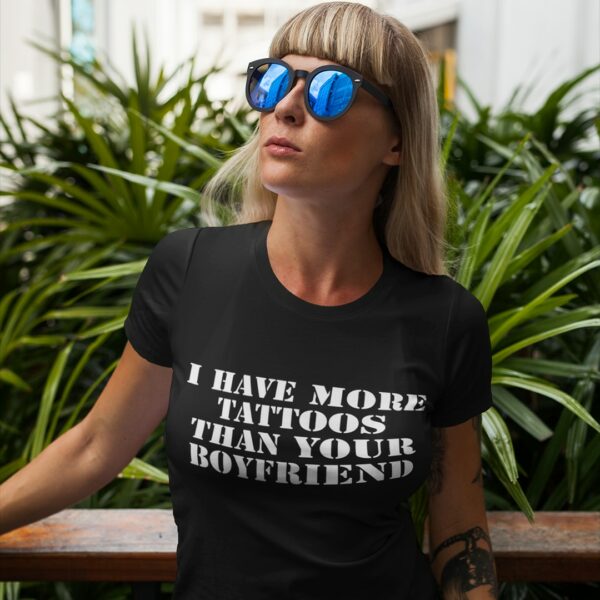 Girl wearing the I have more tattoos than your boyfriend t-shirt