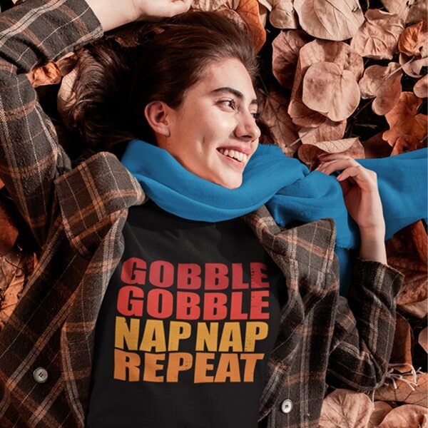 Woman wearing the Gobble Gobble Nap Nap Repeat t-shirt