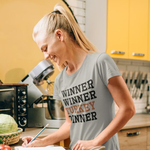 Woman wearing the women's winner winner turkey dinner t-shirt