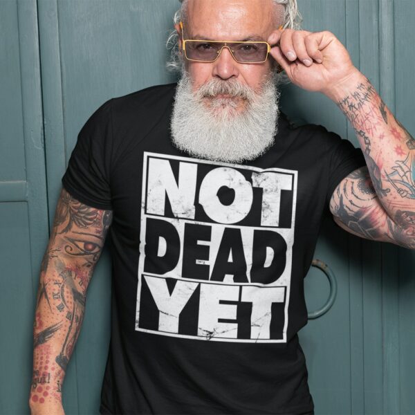 Man wearing a Not Dead Yet t-shirt