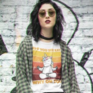 woman wearing an eff you see Kay meditating unicorn t-shirt