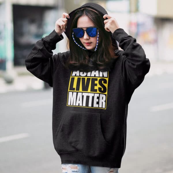 Asian girl wearing an Asian Lives Matter unisex hoodie
