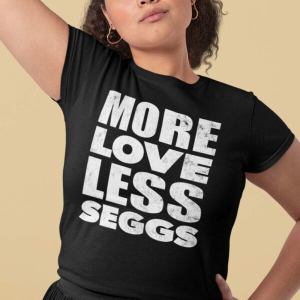 woman wearing a more love less seggs t-shirt