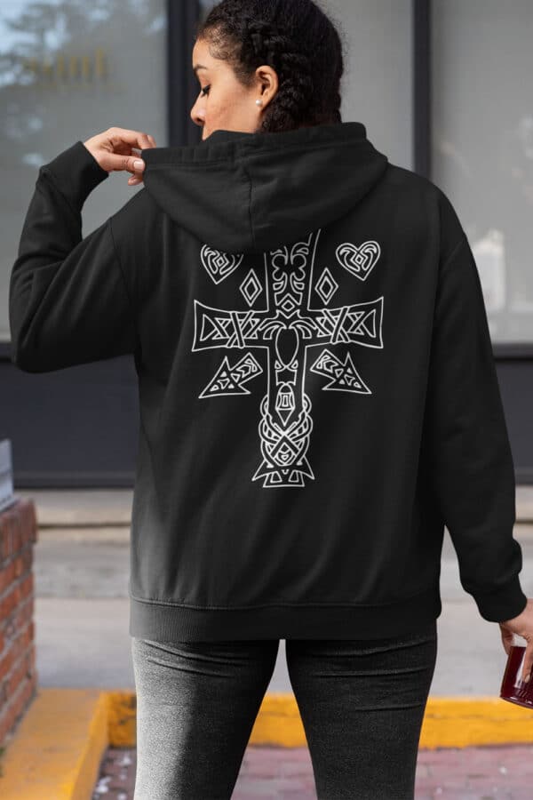 woman wearing a black Celtic cross and hearts hoodie