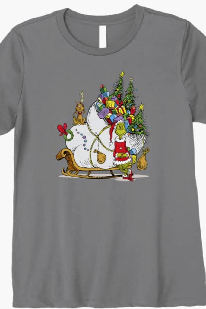 gray Christmas shirt with the Grinch and his sleigh on it.