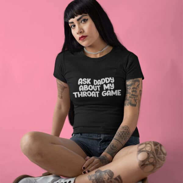 woman wearing an ask daddy about my throat game t-shirt